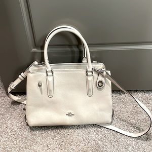 8 pocket off white cross body Coach Bag
